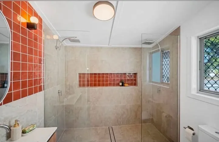 Bathroom project finished view, with ceiling lighting in the finished room